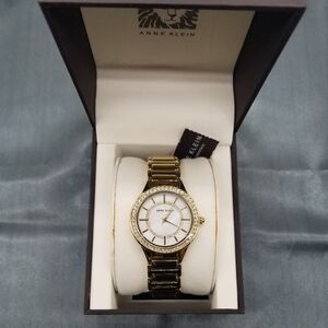 NIB Anne Klein Gold Tone Pearl Dial Diamond Accent Watch